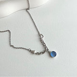 bi サージカルスチールブルーキャットアイコインハートキッチュネックレス / bi Surgical Steel Blue Cats Eye Coin Heart Kitch Necklace