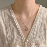 Stamp necklace