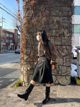 Ancient buckle midi skirt