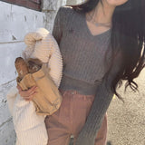 [Belied made] More twisted V-neck embroidery long-sleeved knit