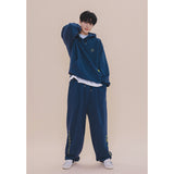 HOLYNUMBER7 X CHOI BYUNGCHAN チックグラフィクストレーニングパンツ