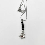 Black drop-star necklace