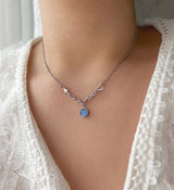bi サージカルスチールブルーキャットアイコインハートキッチュネックレス / bi Surgical Steel Blue Cats Eye Coin Heart Kitch Necklace