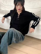 Gender eyelet strap long sleeve knit