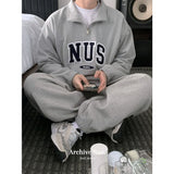 Huke x Nus. half zip-up