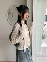 Glo wedding guest look lace pleated string long sleeve blouse