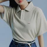 ミニマルロゴニットポロ / MINIMAL LOGO KNIT POLO_MELANGE OATMEAL