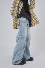 Folds rivet over denim pants