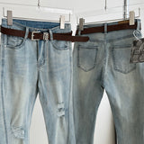 Belted light blue bootcut denim pants