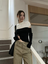 Black and white cut knit top
