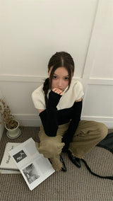 Black and white cut knit top