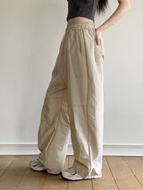ピディナイロンスリット2ウェイロングワイドジョガーパンツ / Pidi Nylon Slit Two-Way Long Wide Jogger Pants