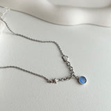 bi サージカルスチールブルーキャットアイコインハートキッチュネックレス / bi Surgical Steel Blue Cats Eye Coin Heart Kitch Necklace