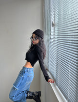 It's soft. A long-sleeved cropped shirt