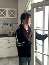 Gender eyelet strap long sleeve knit