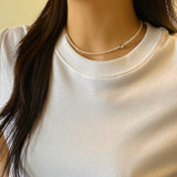 シャイニングウェーブレットネックレス/SHINNING WAVELET NECKLACE