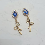 ロイヤルブルークリスタルアンドゴールドリボンピアス / Royal Blue Crystal and Gold Ribbon Piercing