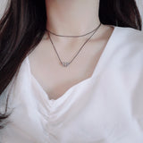 layered string necklace