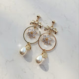 デイジーアンドリボンイヤリング / Gold Daisy and Ribbon Earring