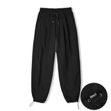 ナイロン2WAYワイドカーブフィットバンディングパンツ / NYLON 2WAY WIDE CURVE FIT BANDING PANTS BLACK