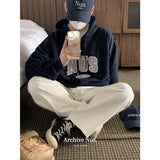 Nus. × HUKE フードTシャツ