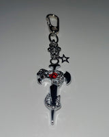ピアスクロススネークキーチェーン / Pierced cross snake keychain