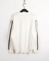 Gender eyelet strap long sleeve knit