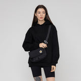 [UNISEX] White Flower Smile Embroidery Cross Mini Messenger Bag_Black (6686423449718)