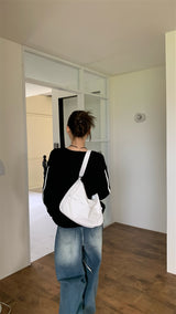 Central loose strap knit