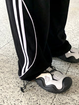 ノイブダブルライントラックインスィジョンストリングツーウェイジョガーパンツ / Nove two-line track incision string two-way jogger pants