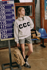 ブラックCCCワッペンスウェットシャツ・アッシュグレー［ユニセックス］/ CCC Black Patch Unisex Ash Grey Sweat Shirt