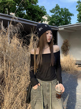 Black off-the-shoulder backless top