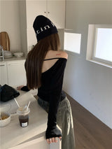 Black off-the-shoulder backless top
