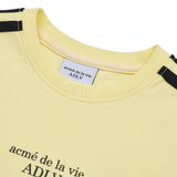ベーシックロゴエンボスプリントトラッククロップTシャツ ライトイエロー