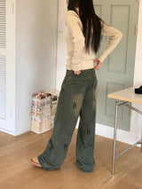 Pale hip lettering washed wide denim pants