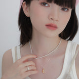 プチポイントカーブリング / petite point curve ring