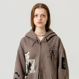 フリンジパッチジップアップフーディ / FRINGE PATCH ZIP UP HOODIE