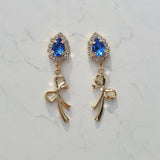ロイヤルブルークリスタルアンドゴールドリボンピアス / Royal Blue Crystal and Gold Ribbon Piercing
