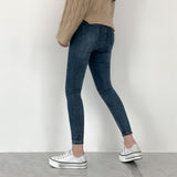 Whiskered Two-Button High Waist Skinny Jeans