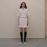 Cream Cancan Mini Skirts