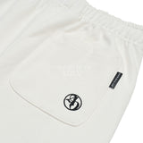 BASIC LOGO NEEDLEWORK SWEAT PANTS CREAM 