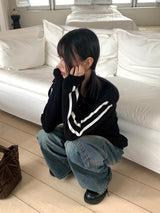 Gender eyelet strap long sleeve knit