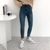 Whiskered Two-Button High Waist Skinny Jeans