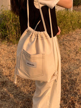 ppocketto ivory string bag