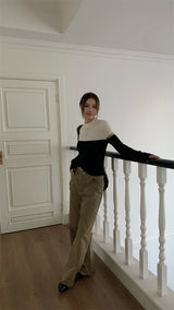 Black and white cut knit top