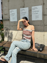Belted light blue bootcut denim pants