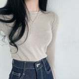 エクステンデッドスリーブラウンドネックTシャツ