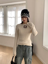 Kinu star point boat neck long sleeve knit