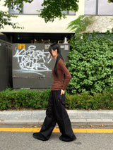 Tatin back buckle strap slit long sleeve t-shirt