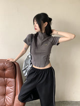 Raping Sporty cut half zip up short sleeve T-shirt